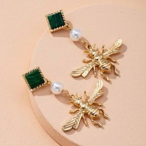 bee shaped faux pearl earrings